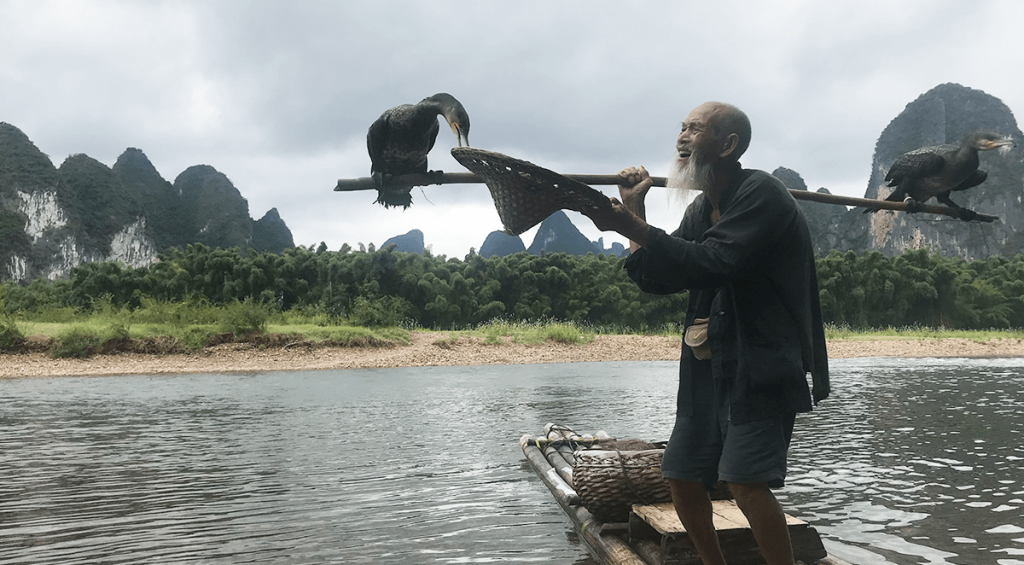 Pescador en el rio Li